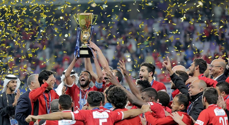 epaselect epa06434114 Al-Ahly's players celebrate winning the Egyptian Super Cup football match between Al-Ahly and Al Masry at Hazza bin Zayed Stadium, City of al-Ain, Abu Dhabi, United Arab Emirates, 12 January 2018.  EPA/MAHMOUD KHALED