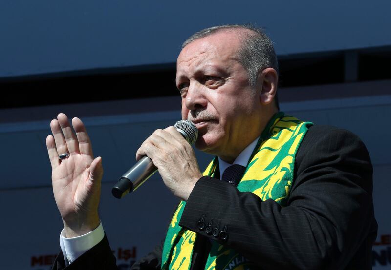 Turkey's President Recep Tayyip Erdogan addresses the supporters of his ruling Justice and Development Party, AKP, during a rally in Sanliurfa, Turkey, Friday, March 8, 2019, ahead of local elections scheduled for March 31, 2019. (Presidential Press Service via AP, Pool)