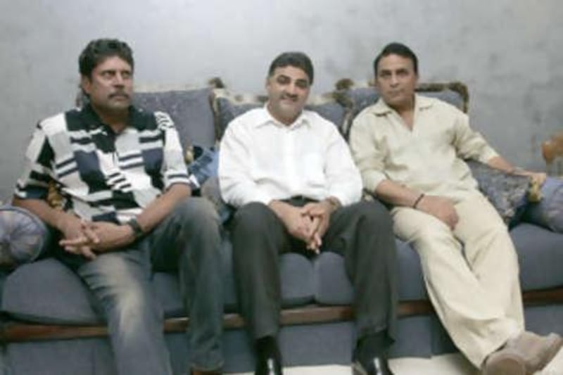 Kapil Dev, left, and Sunil Gavaskar flank Ajay Sethi at the announcement of the event.