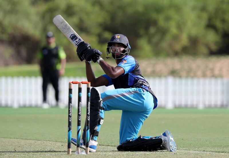 Dubai, United Arab Emirates - Reporter: N/A. Sport. Cricket. ECB Blues' Vriitya Aravind hits a four during the match between the ECB Blues and Dubai in the Emirates D10. Friday, July 24th, 2020. Dubai. Chris Whiteoak / The National