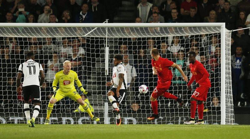 Liverpool’s Ragnar Klavan scores their first goal. Andrew Boyers / Action Images / Reuters