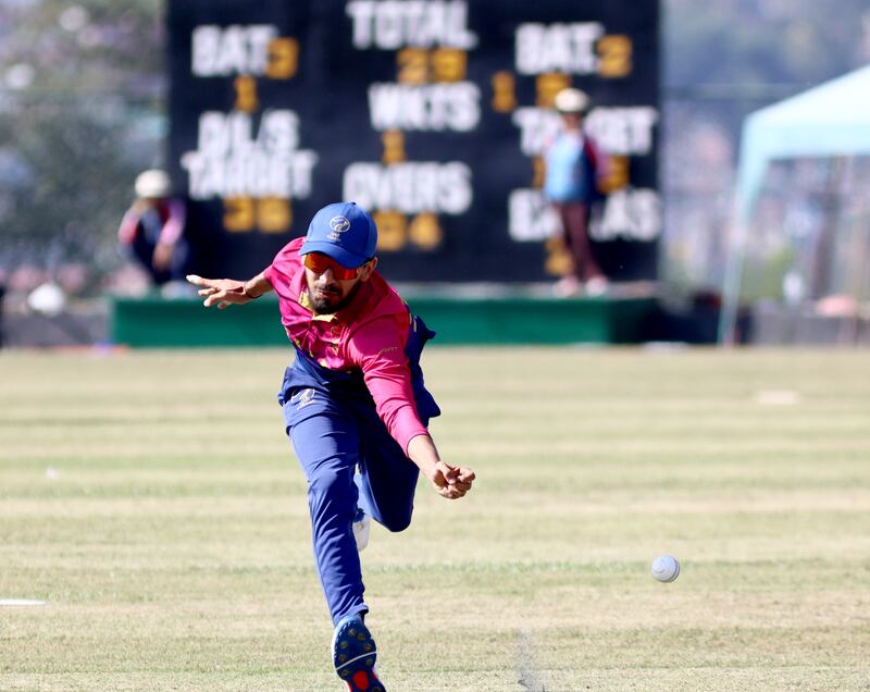 Khalid Shah of UAE misses a catch against Nepal on Friday.