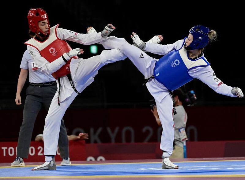 Kimia Alizadeh Zenoorin defeated Britain's reigning champion Jade Jones in the taekwondo women's -57kg elimination round.