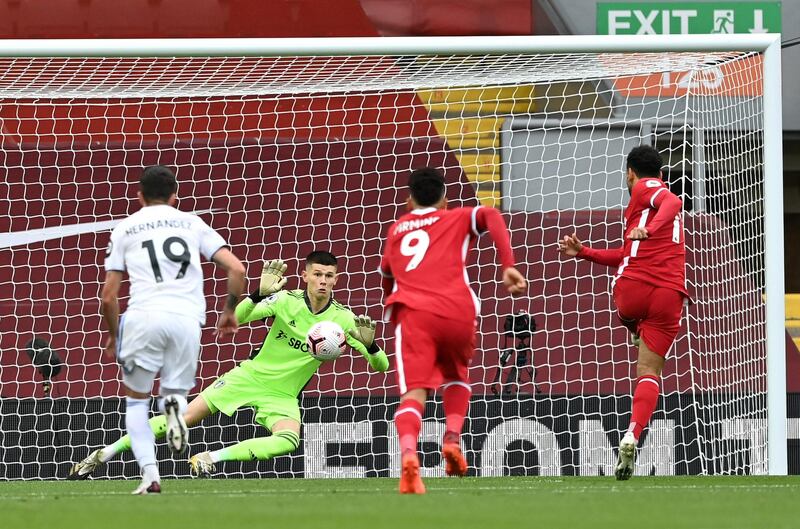 LIVERPOOL, ENGLAND - SEPTEMBER 12: Mohamed Salah of Liverpool scores his team's first goal past Illan Meslier of Leeds United during the Premier League match between Liverpool and Leeds United at Anfield on September 12, 2020 in Liverpool, England. (Photo by Shaun Botterill/Getty Images)