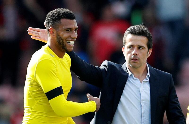 Football Soccer - Premier League - AFC Bournemouth vs Watford - Bournemouth, Britain - August 19, 2017   Watford manager Marco SIlva and Etienne Capoue celebrate after the match     Action Images via Reuters/Matthew Childs     EDITORIAL USE ONLY. No use with unauthorized audio, video, data, fixture lists, club/league logos or "live" services. Online in-match use limited to 45 images, no video emulation. No use in betting, games or single club/league/player publications. Please contact your account representative for further details.