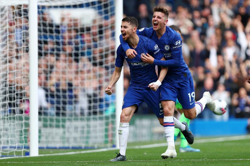 ***BESTPIX*** LONDON, ENGLAND - SEPTEMBER 28: Jorginho of Chelsea celebrates with teammate Mason Mount after scoring his team's first goal during the Premier League match between Chelsea FC and Brighton & Hove Albion at Stamford Bridge on September 28, 2019 in London, United Kingdom. (Photo by Dan Istitene/Getty Images)
