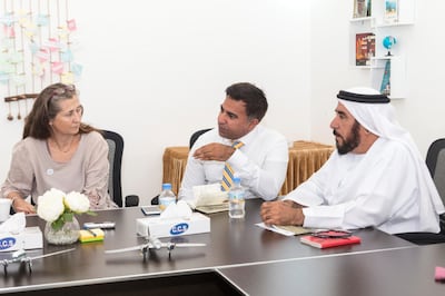 Sharjah, UAE - Mar 19, 2018 - Ms. Hazelle Page, Collections Manager for Sharjah Museums Authority, Mr. Ali Iqbal, a prominent historian, and Dr. Saif Al Bedwawi, military historian, discuss the wreckage from a World War II era crash site at the Al Mahatta Museum, Sharjah - Navin Khianey for The National