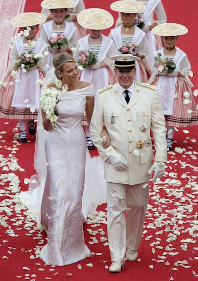 Princess Charlene and Prince Albert II of Monaco leave the palace after their wedding ceremony on July 2, 2011. Getty Images