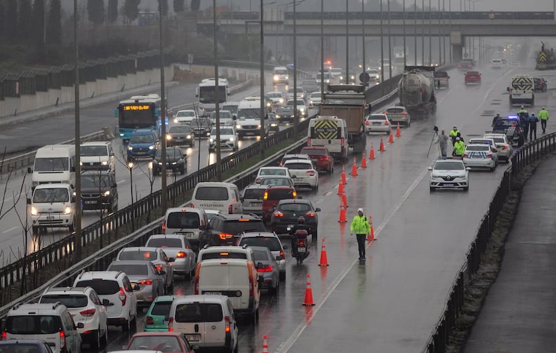 Turkish police officers set up a control point at an exit of Istanbul, Turkey.  EPA