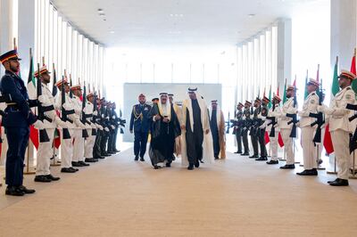 An honour guard and a 21-gun salute greet President Sheikh Mohamed and Sheikh Meshal after the Kuwaiti Emir arrived in Abu Dhabi. UAE Presidential Court