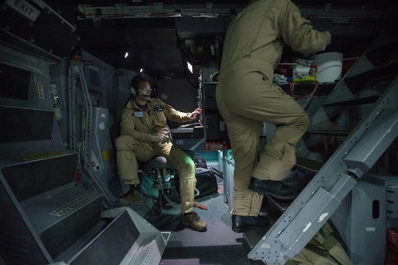 The crew get to work on board the Airbus Military A400M MRTT. Christopher Pike / The National

