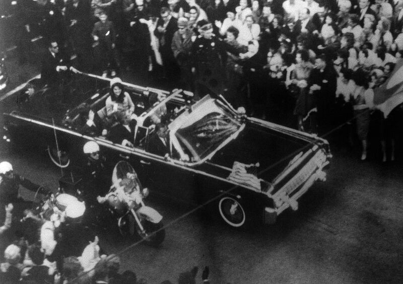 This image provided by the Warren Commission is  an overhead view of President John F. Kennedy's car in Dallas motorcade on Nov. 22, 1963, and was the commission's Exhibit No. 698. Special agent Clinton J. Hill is shown riding atop the rear of the limousine. President Donald Trump is caught in a push-pull on new details of Kennedyâ€™s assassination, jammed between students of the killing who want every scrap of information and intelligence agencies that are said to be counseling restraint. Some 2,800 other files on the assassination have now been made public, and they capture the frantic days following the Nov. 22, 1963 assassination.(Warren Commission via AP)