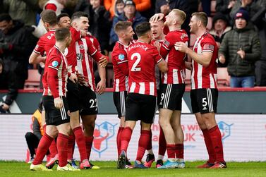 Sheffield United celebrate after the second goal against Bournemouth secured another win and fifth place in the Premier League. Reuters