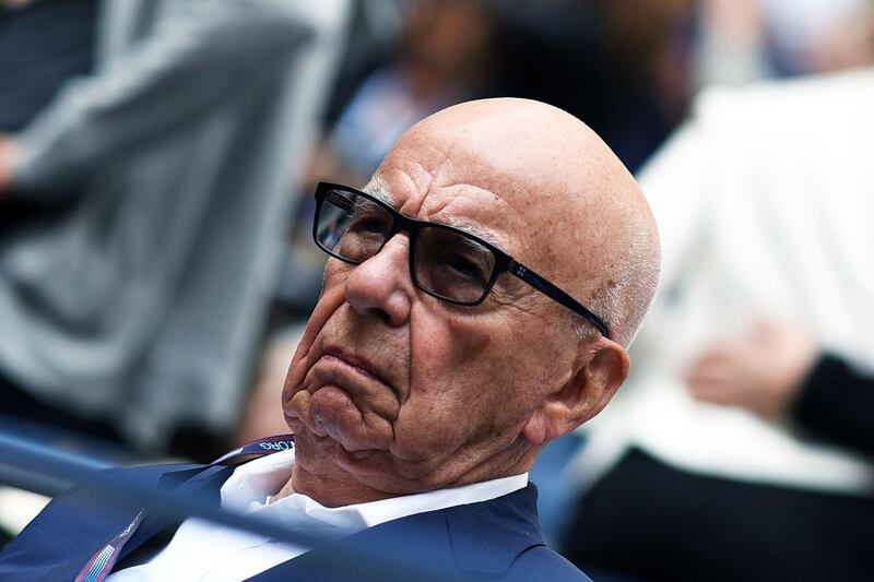 (FILES) In this file photo taken on September 10, 2017 Rupert Murdoch arrives to watch the 2017 US Open Men's Singles final match in New York.
Murdoch's 21st Century Fox said it was cooperating with the European Union after the bloc's officials staged unannounced raids at one of the US media company's London offices on Tuesday. / AFP PHOTO / Jewel SAMAD
