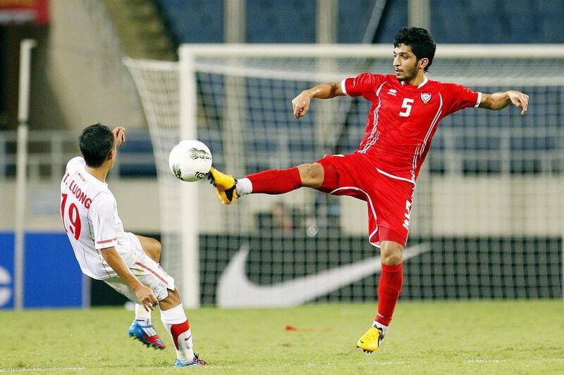 The UAE's Amer Abdulrahman, right, shown during an Asian Cup 2015 qualifying match against Vietnam. Luong Thai Linh / EPA / February 6, 2013