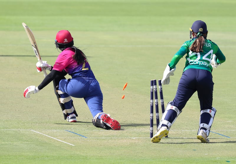 UAE's Khushi Sharma is stumped by Ireland wicketkeeper Amy Hunter for 24