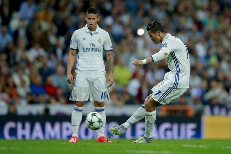 Cristiano Ronaldo scores from a free-kick to equalise for Real Madrid against Sporting Lisbon. The match ended 2-1 to Real Madrid. Gonzalo Arroyo Moreno / Getty Images