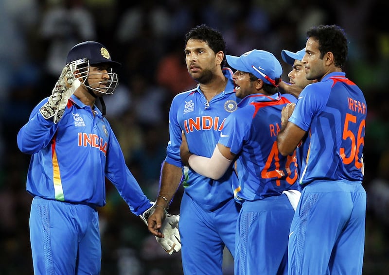 Captain MS Dhoni, Yuvraj Singh, Virat Kohli and Suresh Raina during the T20 World Cup match against South Africa at the R. Premadasa Stadium in Colombo on October 2, 2012. Getty
