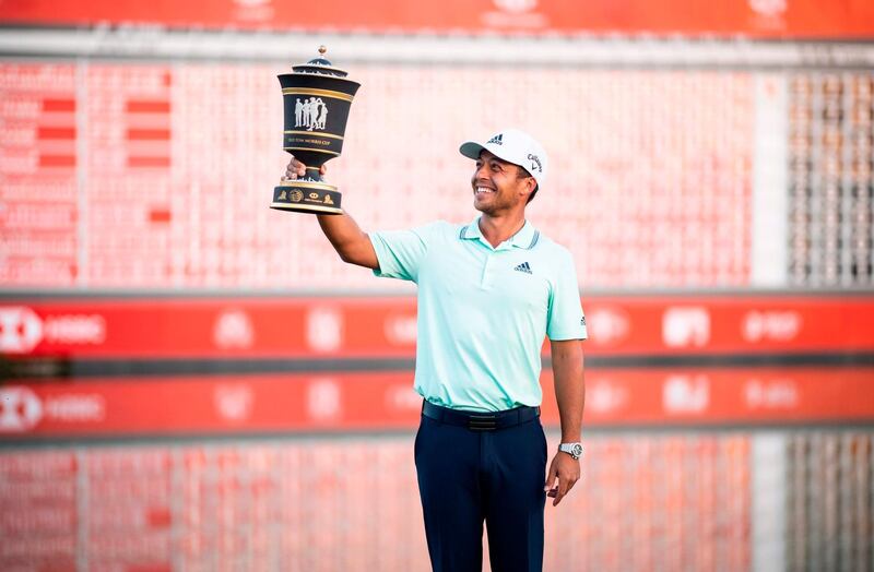 Xander Schauffele of the US poses with the trophy after winning the WGC-HSBC Champions golf tournament in Shanghai on October 28, 2018. / AFP / JOHANNES EISELE
