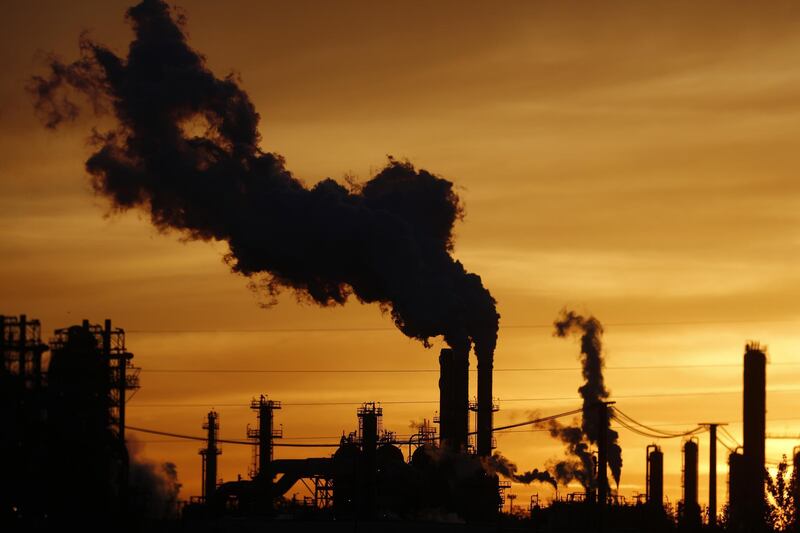 Bloomberg Best of the Year 2017: Emissions rise from the Phillips 66 Wood River Refinery at sunrise in Roxana, Illinois, U.S., on Tuesday, April 24, 2017. Photographer: Luke Sharrett/Bloomberg