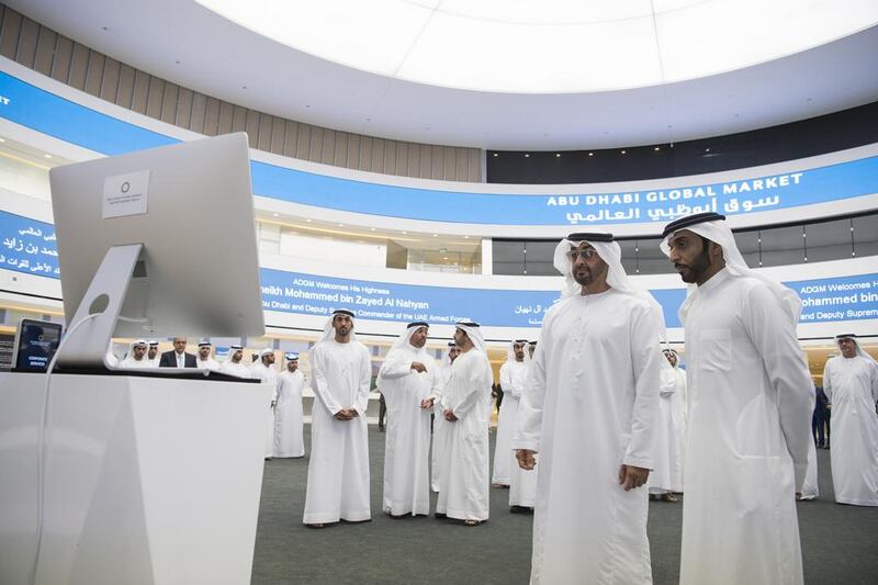 Sheikh Mohammed watches a presentation. Hamad Al Kaabi / Crown Prince Court - Abu Dhabi