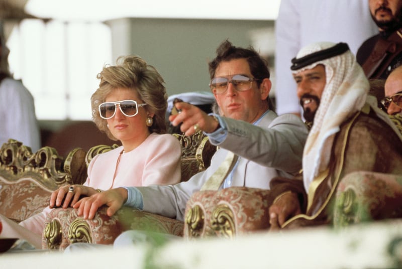 Prince Charles and Princess Diana watch camel racing in Abu Dhabi on March 15, 1989.  