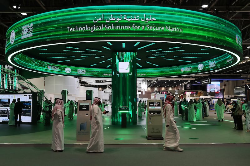 DUBAI, UNITED ARAB EMIRATES, December 7 – Visitors at the Kingdom of Saudi Arabia stand on the second day of GITEX Technology Week held at Dubai World Trade Centre in Dubai. (Pawan Singh / The National) For News/Online. Story by Kelly 