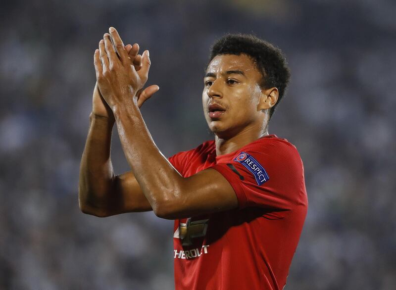 Jesse Lingard acknowledges Manchester United fans at the Partizan Stadium. Getty Images