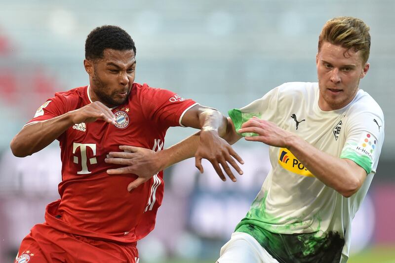 Bayern Munich's Serge Gnabry in action with Monchengladbach's Nico Elvedi. Reuters