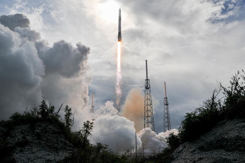 A SpaceX Falcon rocket lifts off from Cape Canaveral Air Force Station in Cape Canaveral, Fla., Monday, April 2, 2018. The Falcon rocket blasted off from Cape Canaveral, Florida, Monday, hoisting a Dragon capsule full of food, experiments and other station goods for NASA. The Dragon and its 6,000-pound shipment should reach the space station Wednesday. The station astronauts will use a robot arm to grab it. (Craig Bailey/Florida Today via AP)