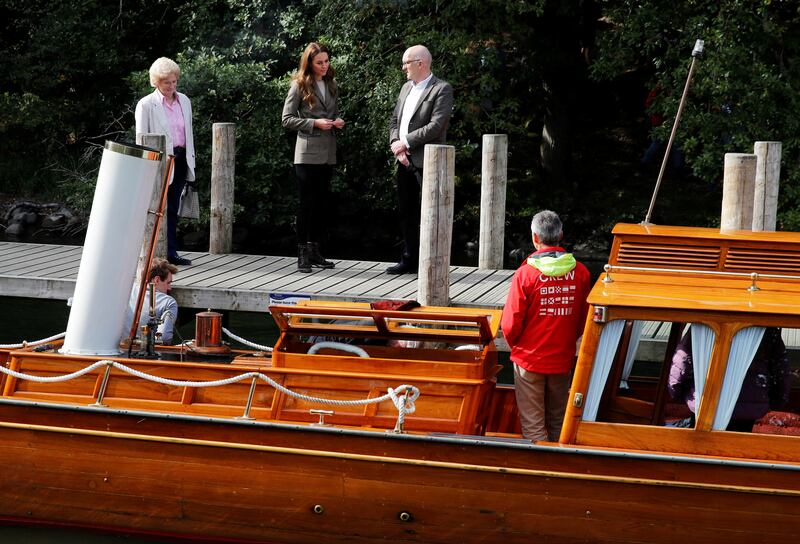 The Duchess of Cambridge waits to board the boat at Wray Castle. Reuters