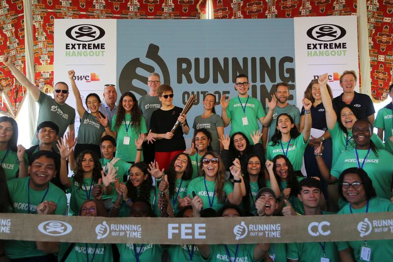 Scotland's First Minister Nicola Sturgeon holds batons at the finish line of the Running Out Of Time climate relay, which arrived from Glasgow, Scotland after 40 days to reach Cop27 in Egypt. AP Photo