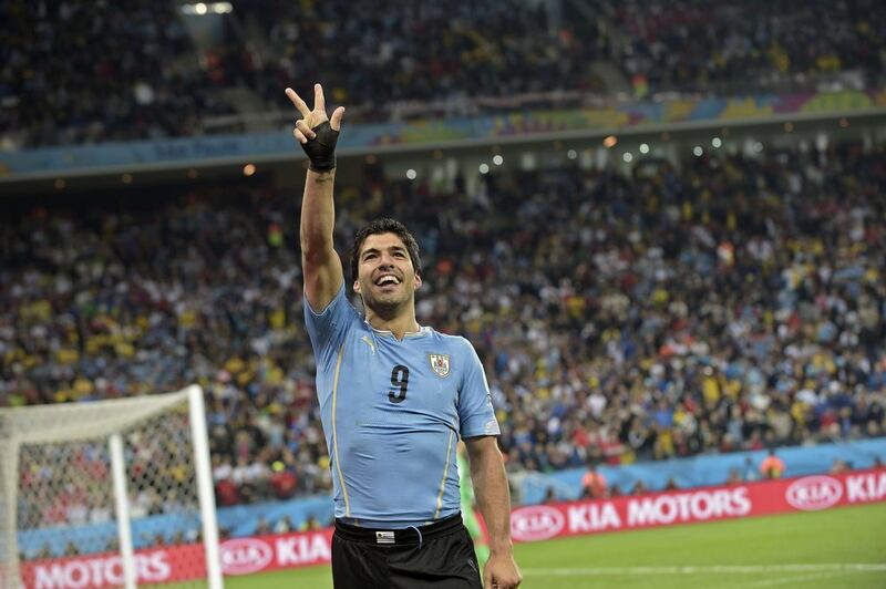 =30) Luis Suarez (Uruguay) seven goals in 13 games. AFP