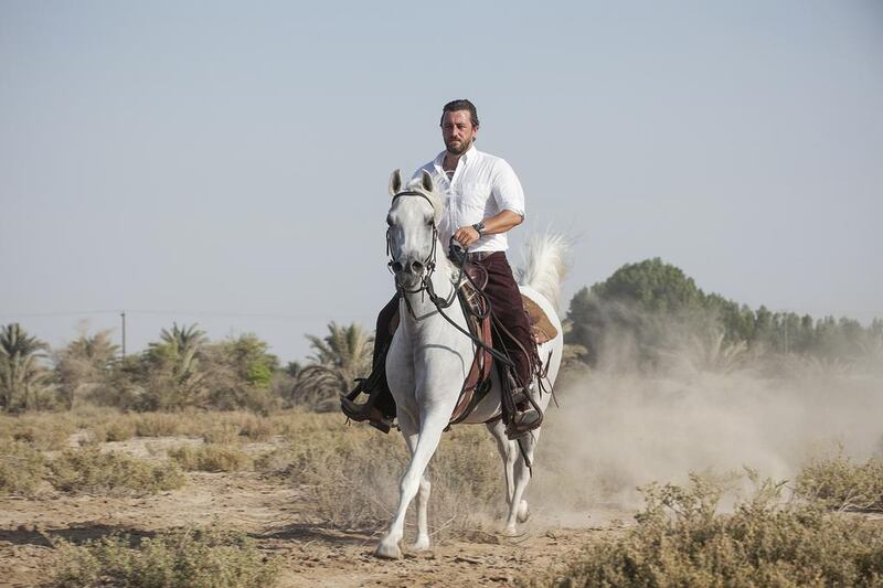 At the recent Abu Dhabi International Hunting and Equestrian Exhibition, Emirati Amru Al Abidi took only four hours to break in a horse using an equestrian style known as natural horsemanship, which is gaining popularity in the UAE. Mona Al Marzooqi / The National