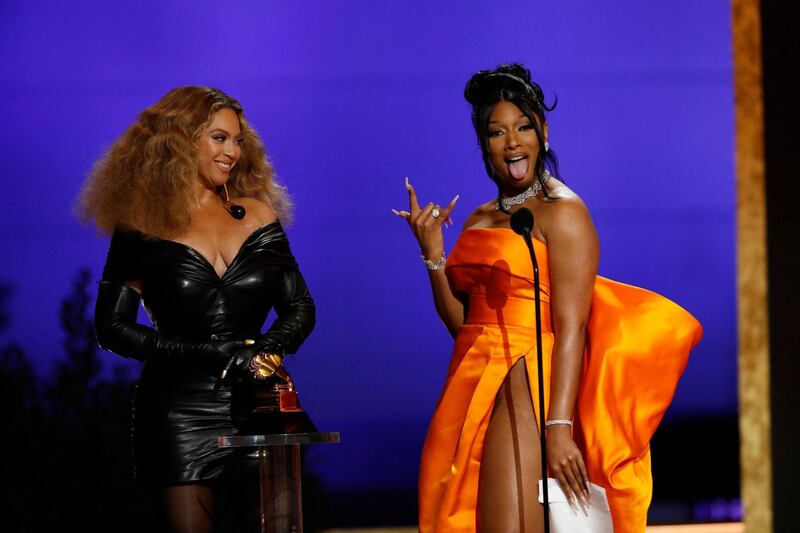 Beyonce and Megan Thee Stallion accept the Best Rap Performance award for 'Savage' onstage during the 63rd Grammy Awards. AFP