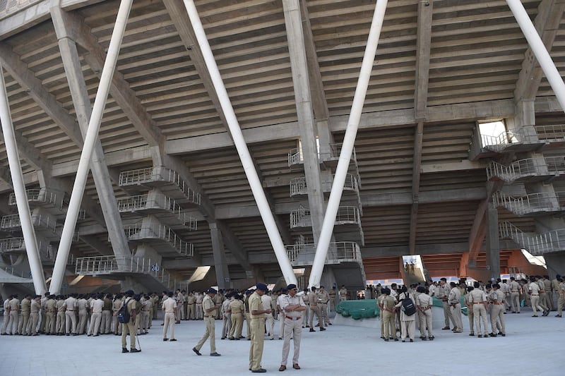 Police personnel gather in the campus of Sardar Patel Stadium, in Motera. AFP