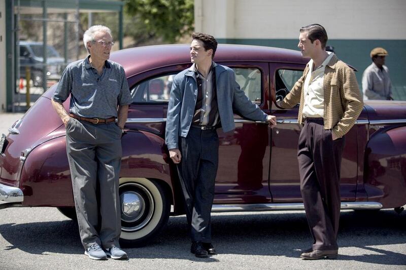 Clint Eastwood, from left, Vincent Piazza and Michael Lomenda on the set of Jersey Boys. Courtesy Warner Bros, Keith Bernstein / AP photo