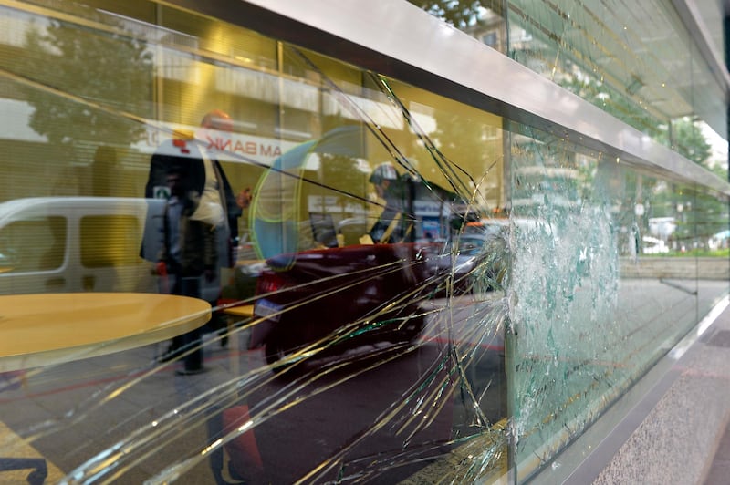 A damaged window at a branch of Bank BSL during anti-government protests in Beirut, Lebanon.  EPA