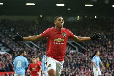 epa08279037 Anthony Martial of Manchester United celebrates scoring a goal during the English Premier League match between Manchester United and Manchester City held at Old Trafford in Manchester, Britain, 08 March 2020. EPA/PETER POWELL EDITORIAL USE ONLY. No use with unauthorized audio, video, data, fixture lists, club/league logos or 'live' services. Online in-match use limited to 120 images, no video emulation. No use in betting, games or single club/league/player publications