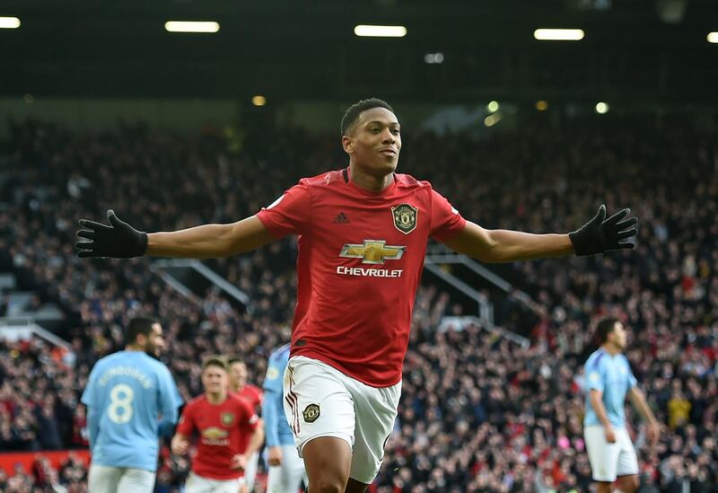 epa08279037 Anthony Martial of Manchester United celebrates scoring a goal during the English Premier League match between Manchester United and Manchester City held at Old Trafford in Manchester, Britain, 08 March 2020.  EPA/PETER POWELL EDITORIAL USE ONLY. No use with unauthorized audio, video, data, fixture lists, club/league logos or 'live' services. Online in-match use limited to 120 images, no video emulation. No use in betting, games or single club/league/player publications