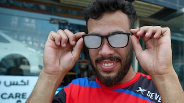 A resident's glasses steam up on a humid day in Abu Dhabi. Victor Besa / The National