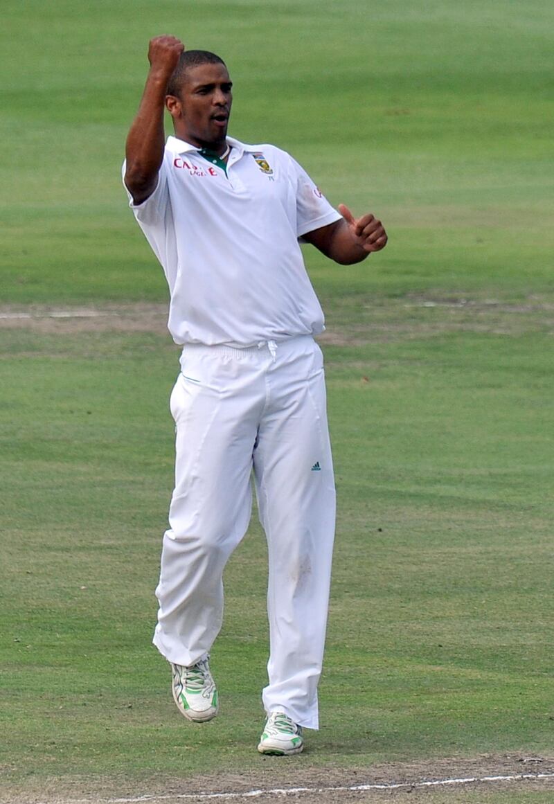 South Africa's bowler Vernon Philander celebrates after taking the wicket of Australia's Brad Haddin on the fifth and final day of the second and final Test between South Africa and Australia at the Wanderers Stadium in Johannesburg on November 21, 2011.          AFP PHOTO / ALEXANDER JOE