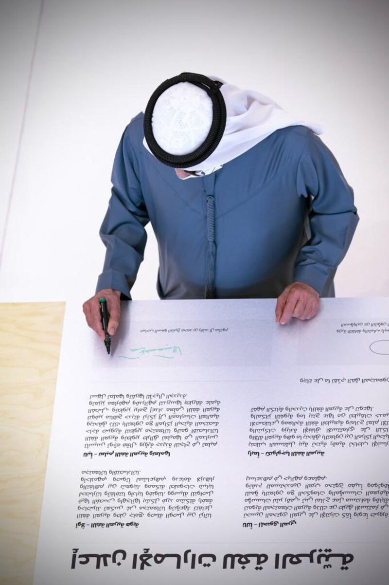 Sheikh Mohammed signs the UAE Declaration on the Arabic Language at the summit.