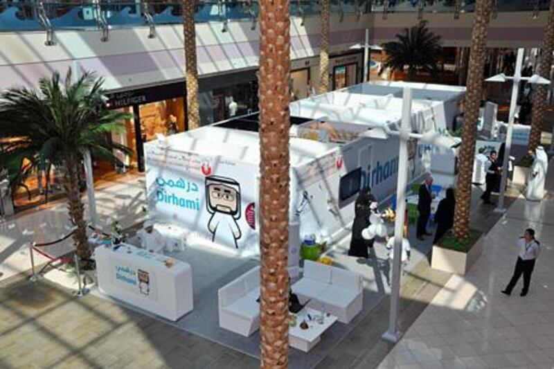 The Abu Dhabi Council for Economic Development (ADCED) launched the Dirhami initiative’s first public exhibition stand at Marina Mall, Abu Dhabi. Photo courtesy ADCED