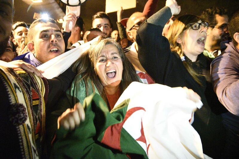 Algerians celebrate in Algiers. AFP