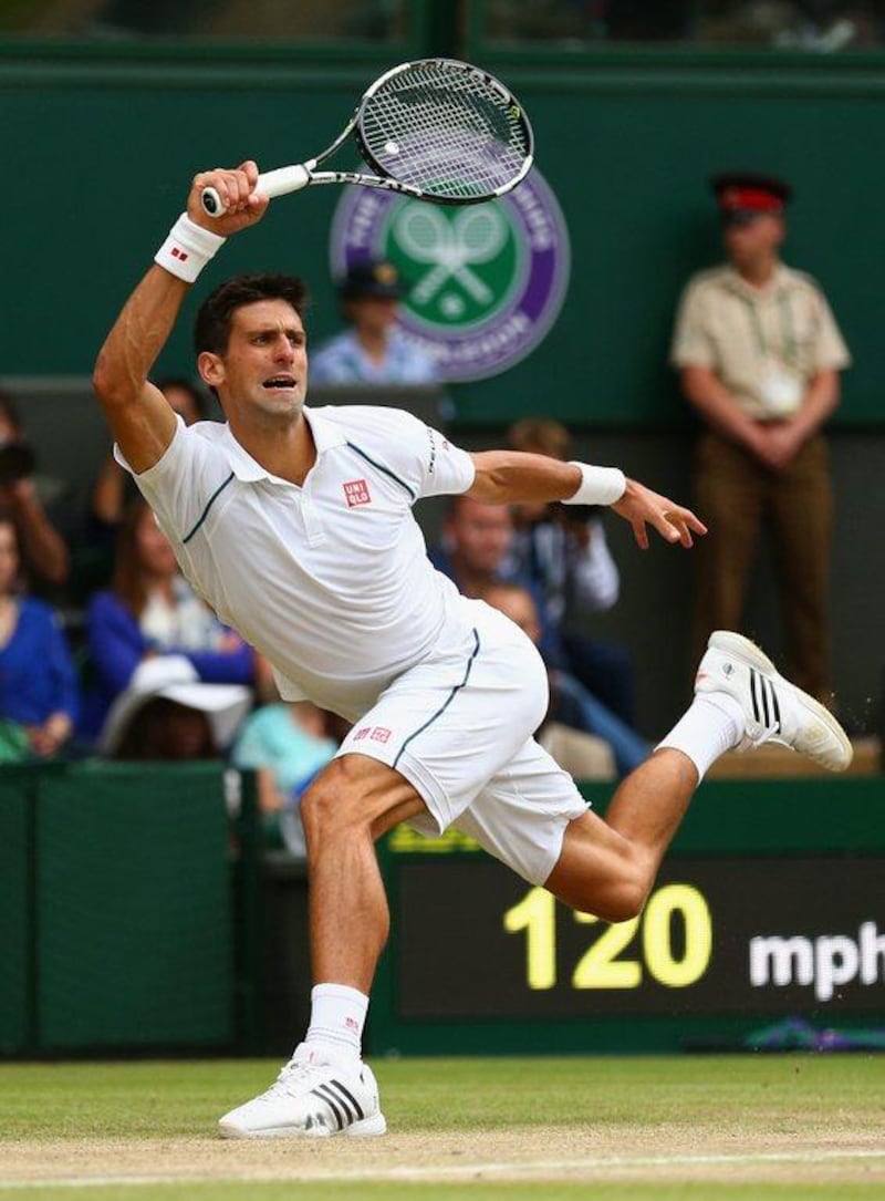 Novak Djokovic of Serbia plays a forehand against Roger Federer of Switzerland during the Wimbledon men's final at the All England Club on July 12, 2015 in London, England. (Photo by Clive Brunskill/Getty Images)