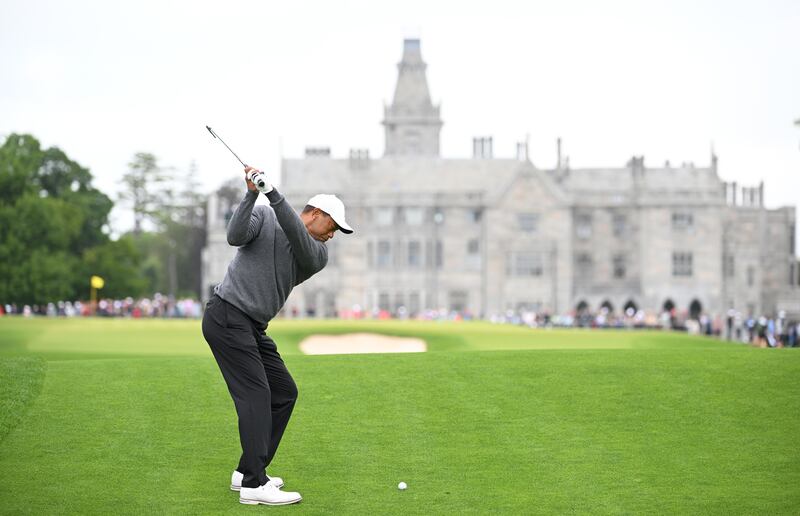 Tiger Woods  plays his second shot at the 9th hole. Getty Images