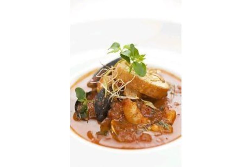 Marco Pierre White's Traditional Mediterranean Seafood Soup with Basil and Garlic Croutons.