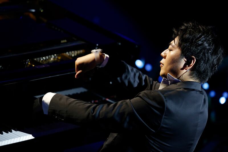 Chinese pianist Lang Lang performs during the opening ceremony of Expo 2020 Dubai at Al Wasl Plaza. EPA