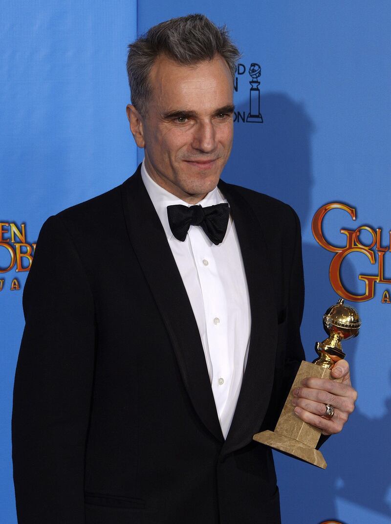 epa03534712 British actor Daniel Day-Lewis holds his Golden Globe award for Best Actor in a Motion Picture - Drama for his role in 'Lincoln' during the 70th annual Golden Globe Awards held at the Beverly Hilton Hotel in Beverly Hills, Los Angeles, California, USA, 13 January 2013.  EPA/PAUL BUCK *** Local Caption ***  03534712.jpg